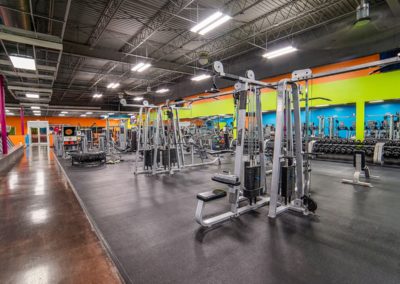 Cable Machines and a large exercise floor at Blue Moon Fitness Gym in Central Omaha